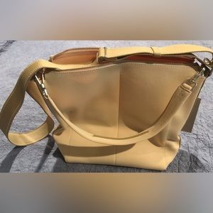 Rothy’s Mini Zip Bucket Bag in Butter Yellow